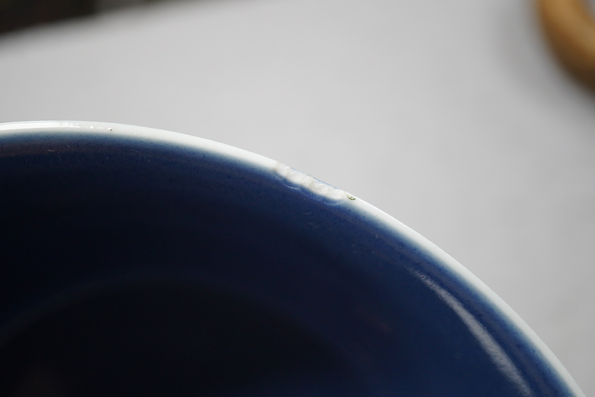 A pair of Chinese powder blue glazed bowls, Daoguang mark and of the period (1821-50)